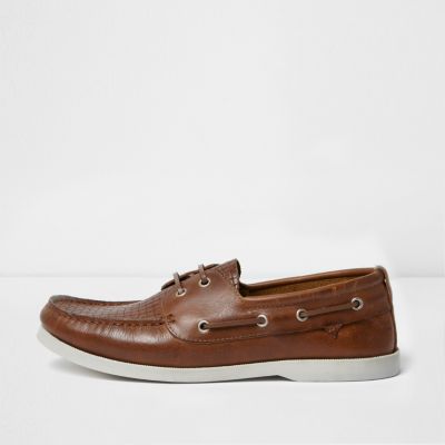 Tan woven boat shoes